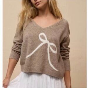 American Eagle Outfitters Tan Off-the-Shoulder Sweater with White Bow